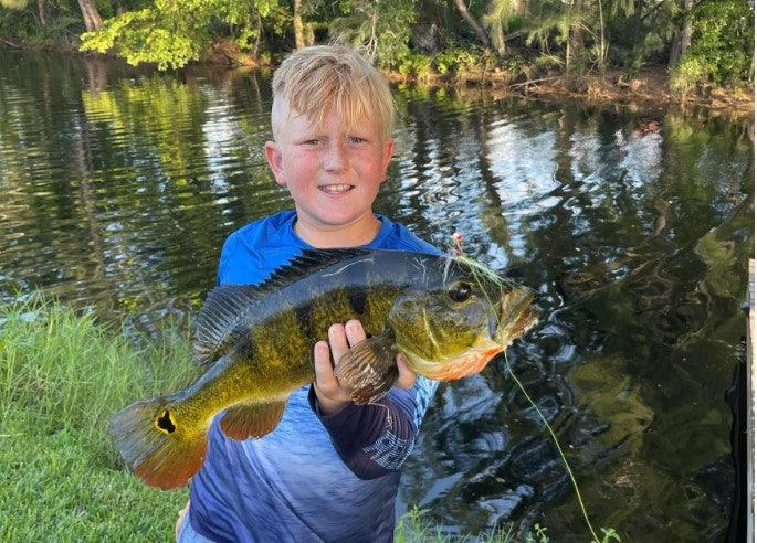 Why It Is Important To Take A Kid Fishing - FishAndSave